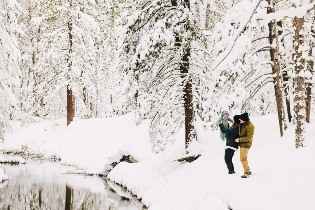 Tahoe family photographer captures authentic family moment in fresh snow back drop in Truckee