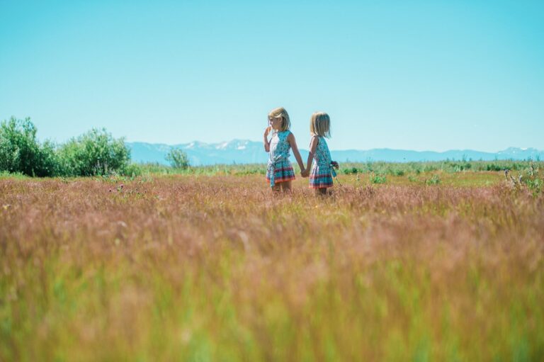 Lake Tahoe photographer capturing triplet sisters in Tahoe city on a summer morning