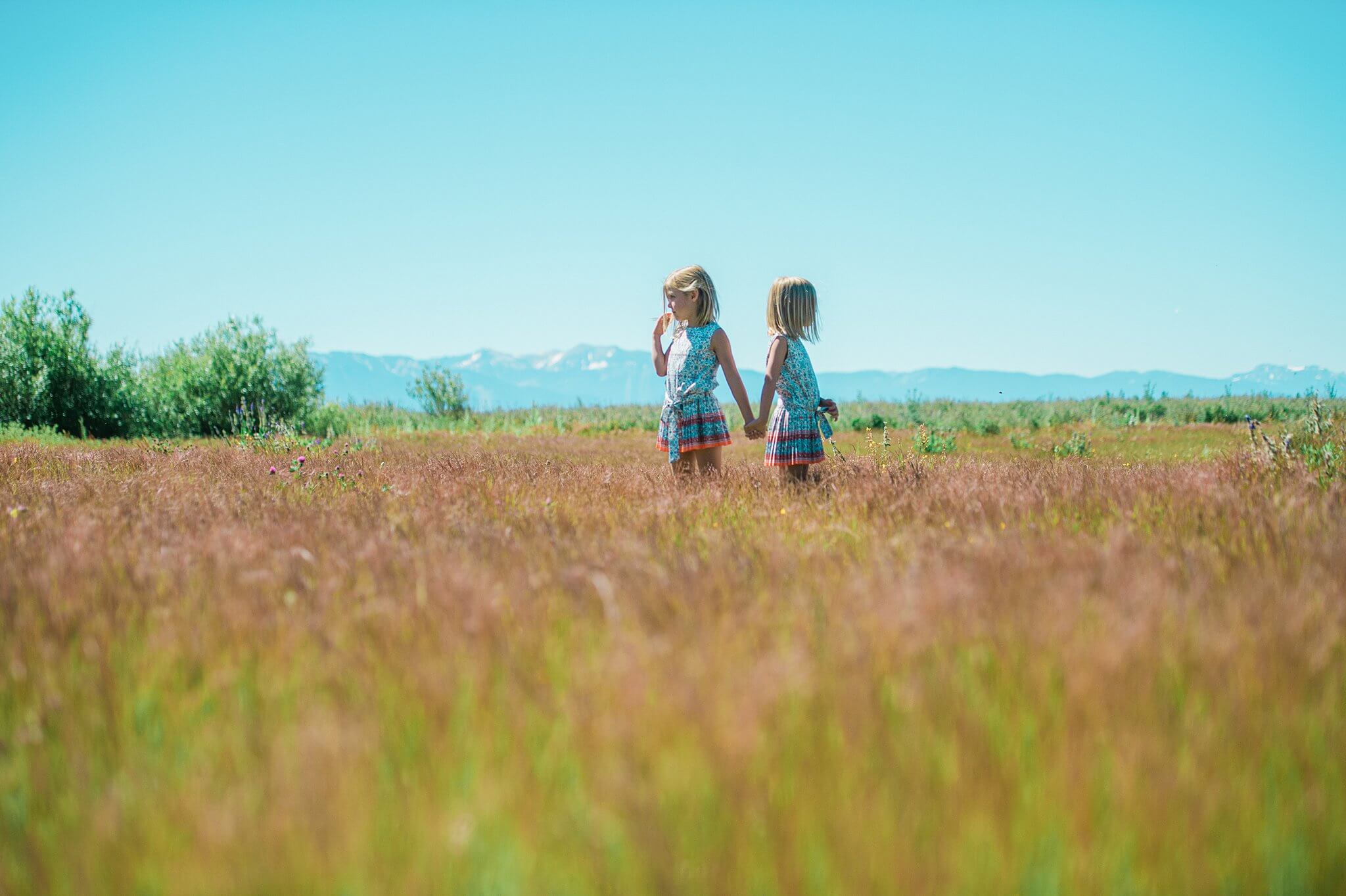 Lake Tahoe photographer capturing triplet sisters in Tahoe city on a summer morning
