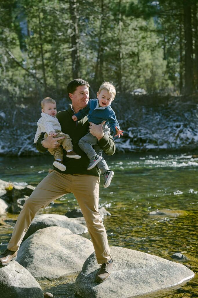 Dad holding both kids