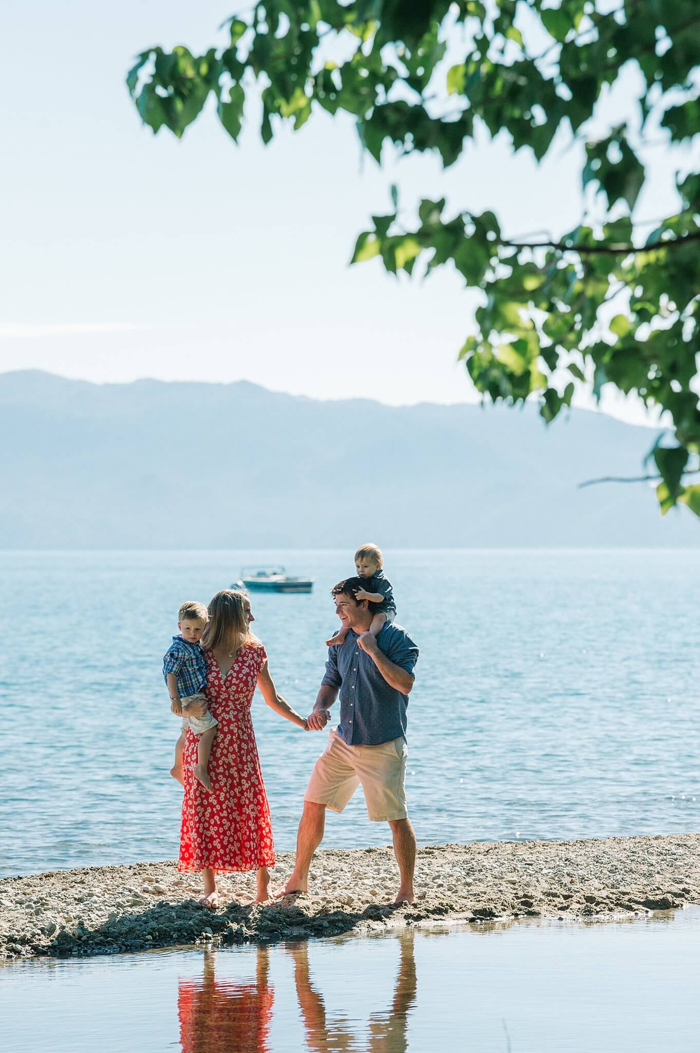 Family with a toddler and baby on a morning family session on Lake Tahoe
