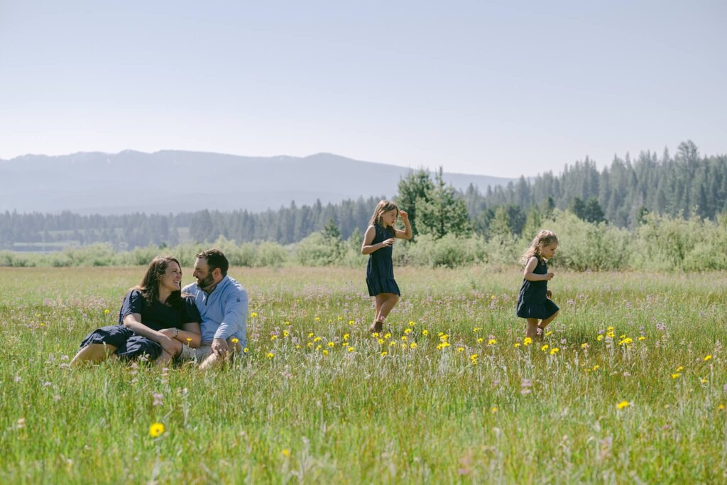 Family portrait in a Truckee field of flowers photographed by North Lake family photographer Annie X