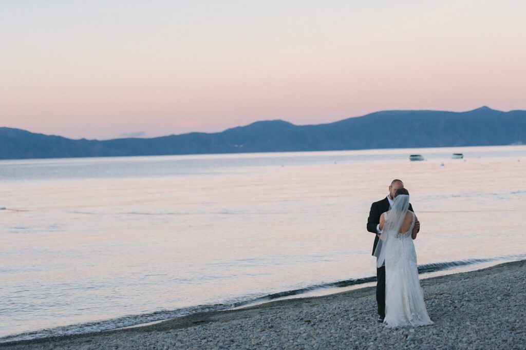 Bride and Groom Beach side at sunset at Chamber's Landing