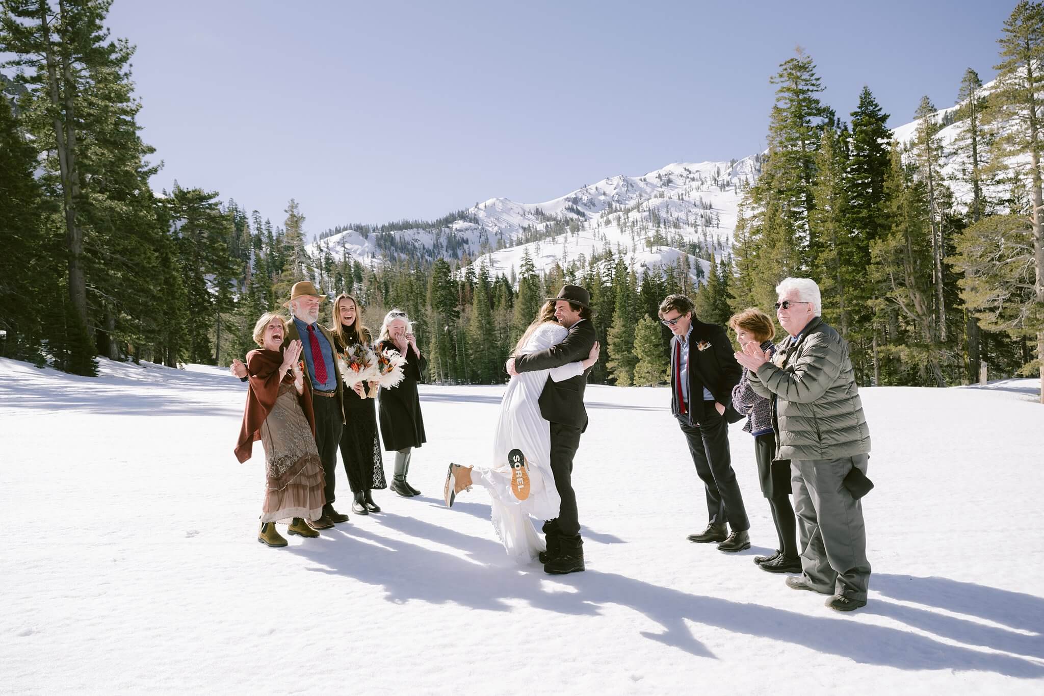 elopement ceremony with family in winter wedding in mountains