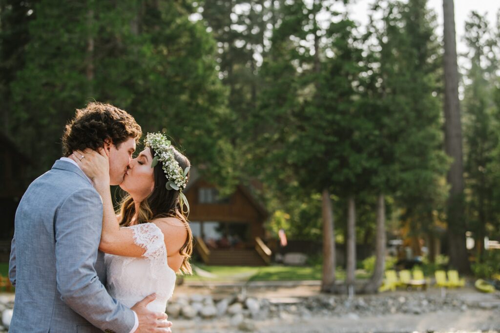 first look on pier sealed with a kiss at intimate weddings in Lake Tahoe at private residence captured by your favorite lake Tahoe wedding photographer