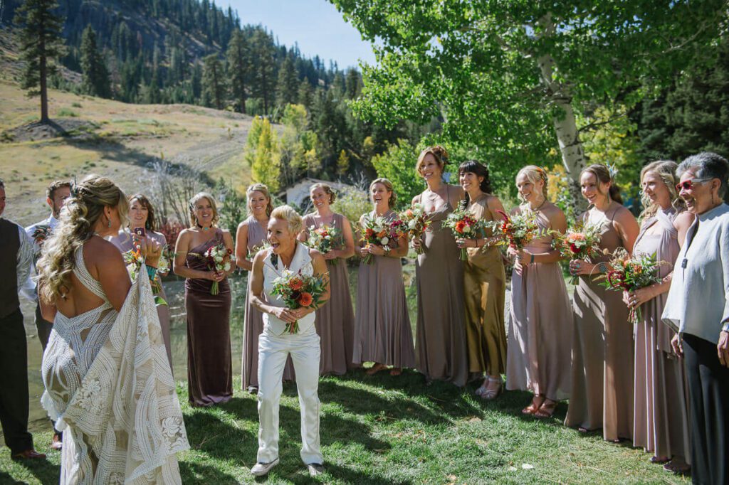 Wedding first look at it's best with your wedding party at Palisades Tahoe photographed by Lake Tahoe wedding photographer Annie X Photographie