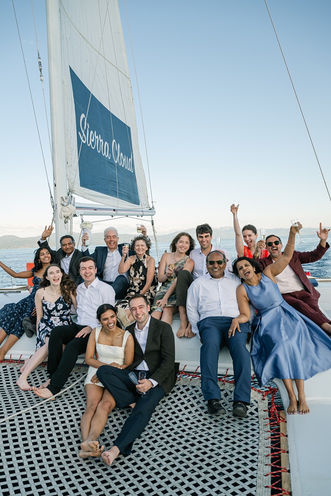 Sierra Cloud catamaran wedding in Tahoe with champagne celebration with the whole family cheering