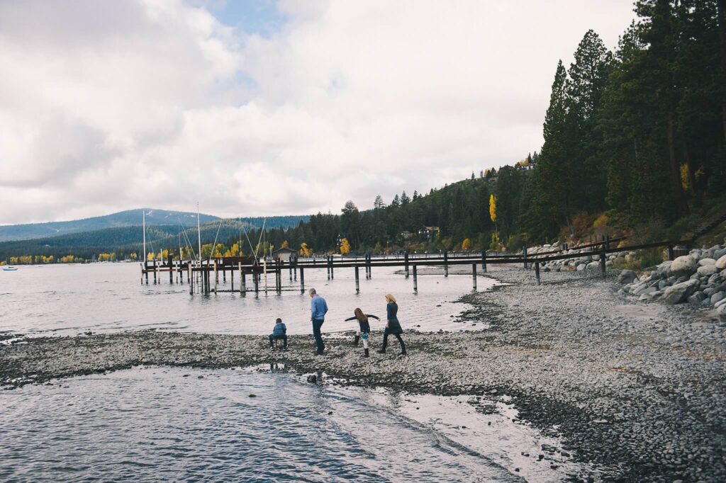 Tahoe family photographer photographing family at their Tahoe lakefront home
