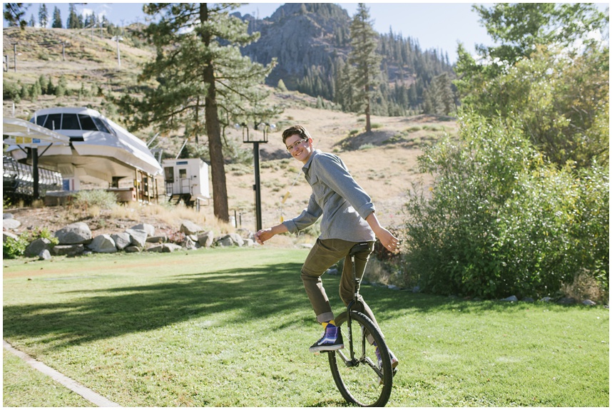 Tahoe senior photos of boy on unicycle at the base of Palisades Tahoe
