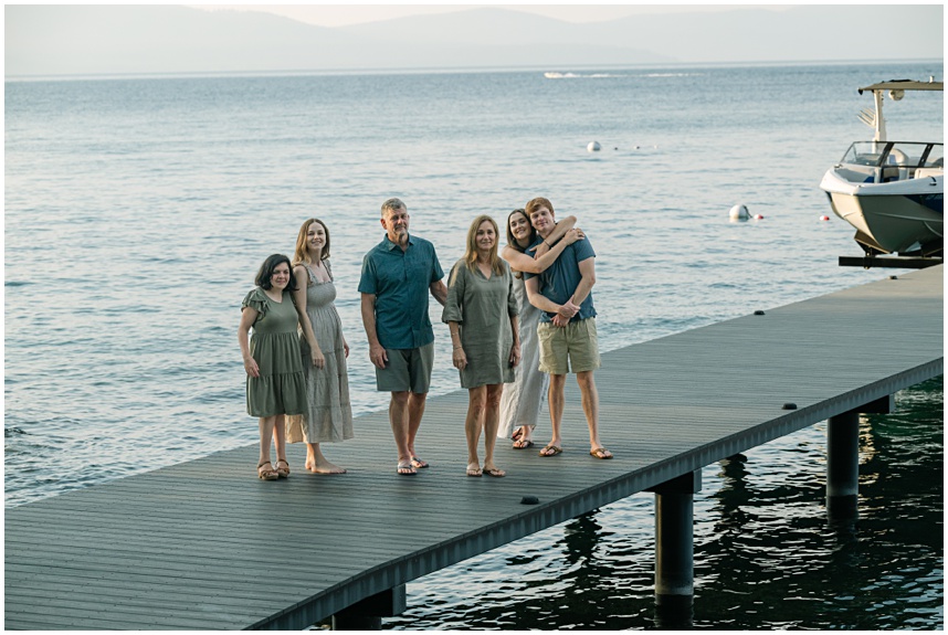 Relaxed family photography session at a lakefront home on a pier at sunset captured by North Lake Tahoe family photographer Annie X Photographie