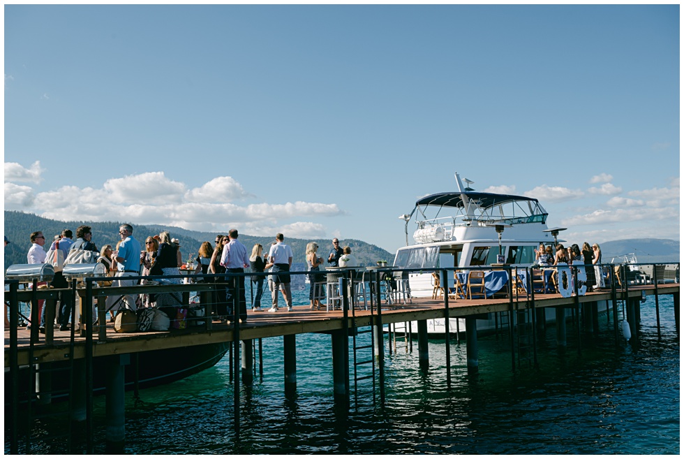 Lake Tahoe event photographer Annie X capturing birthday celebration view of chambers landing guests before boarding Tahoe blue wave