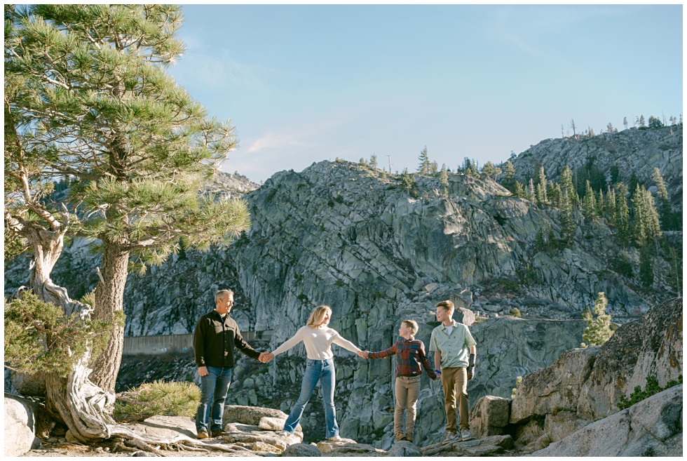 Fall family photos in Tahoe with golden light hitting the granite in Truckee