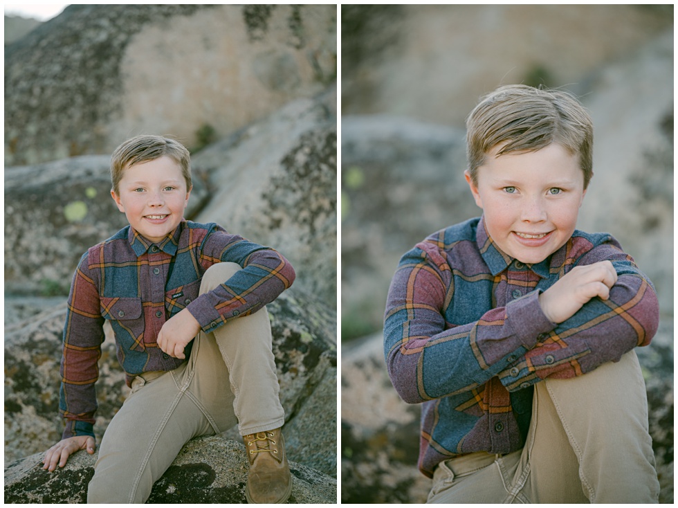 Boy sitting on granite rock photographed by Truckee family photographer Annie X Photographie