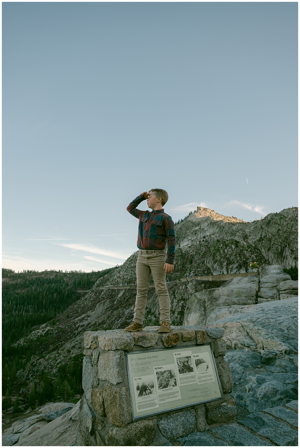candid moment during a Truckee fall family photo session standing looking out