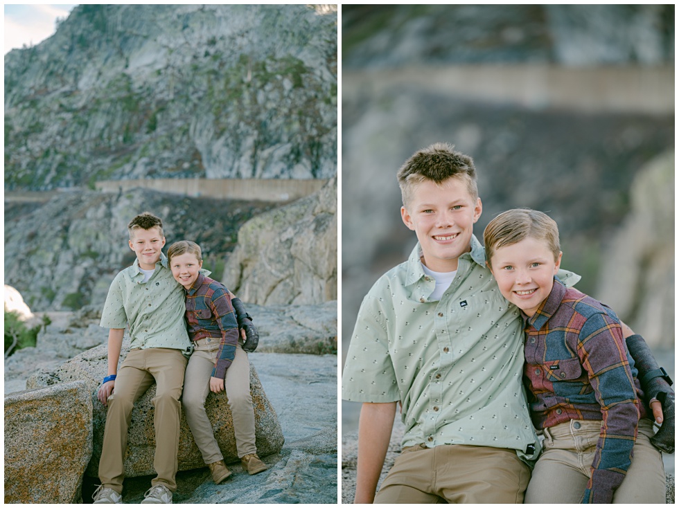Truckee family photographer capturing brothers sitting on Donner Summit granite rock