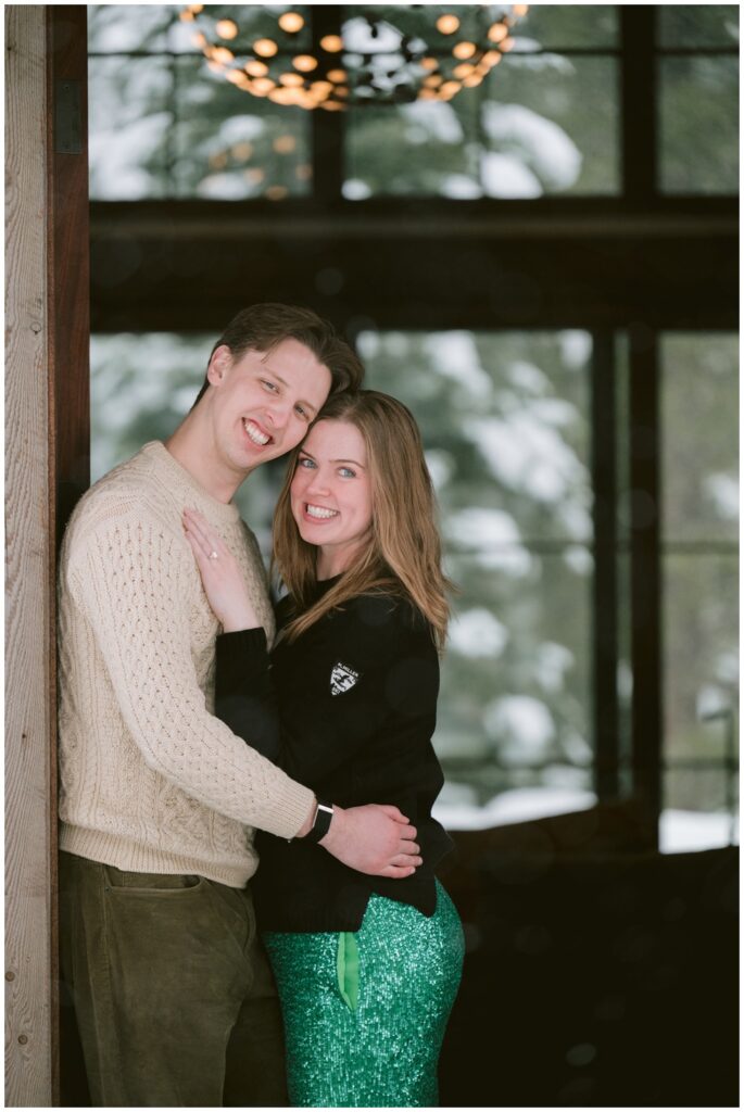Happy couple in entrance of family home in Tahoe