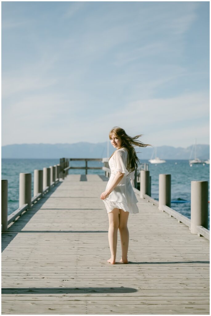 Senior walking barefoot on the Valhalla pier, South Lake Tahoe