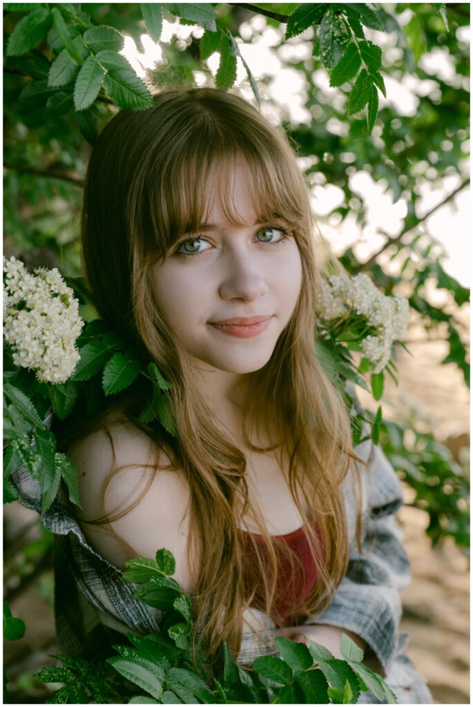 Senior portrait with white flowers in plaid, Valhalla South Lake Tahoe