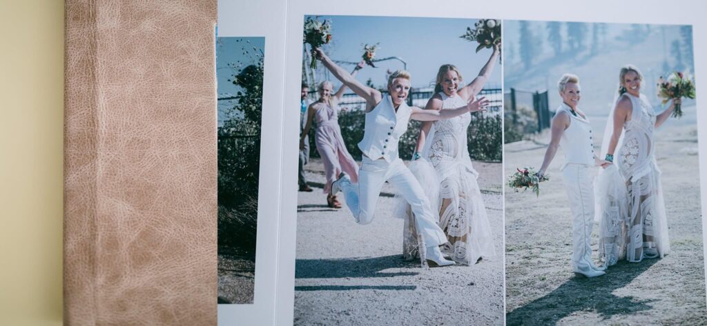 image of leather spine of wedding album and a spread of Newlyweds just married feeling of the two brides walking out of their ceremony